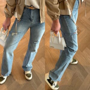 Lichtblauwe straight leg jeans met scheuren en high waist pasvorm